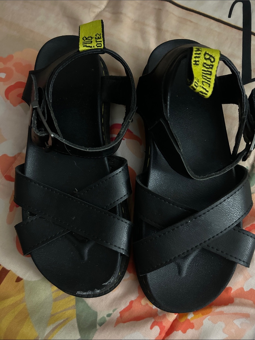 Dr martins woman’s Black Cross-Strap Sandals with Yellow Loop Detail